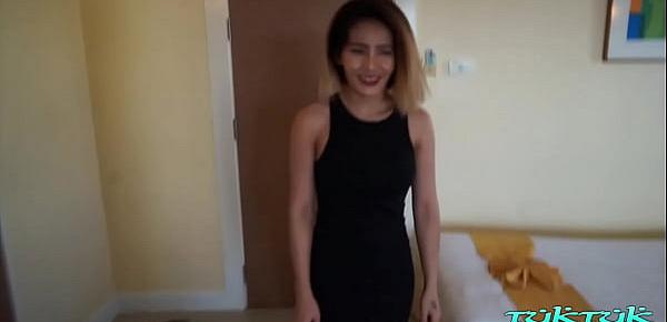  Tatted Thai babe with big fake tits and insatiable horniness